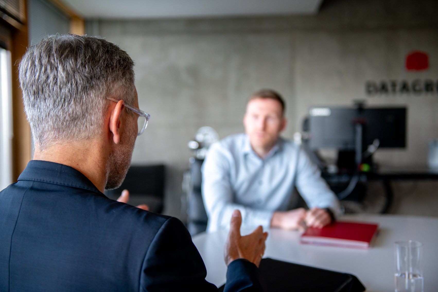 Two businesspeople in conversation