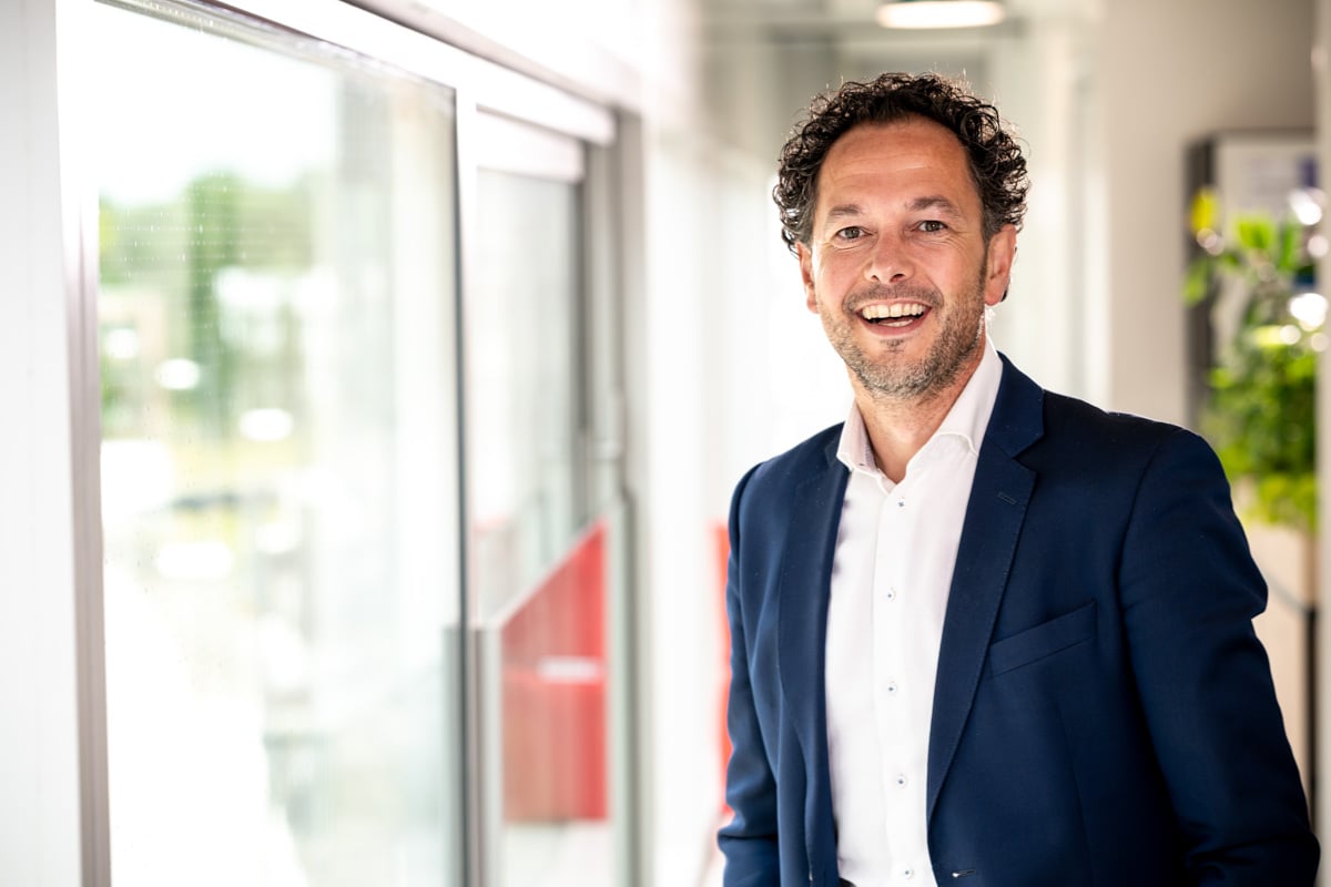 Gelukkige man in Business At